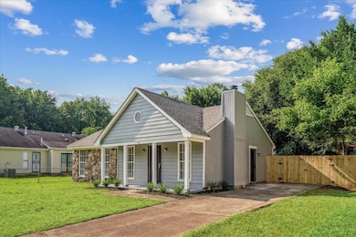 View of front of house with a gate, a chimney, a shingled roof, a porch, and stone siding