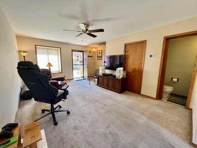Another view of the great room and front door.