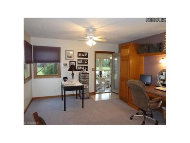 Formal dining room is currently used as office, bu