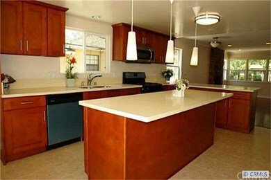Island kitchen with eating area