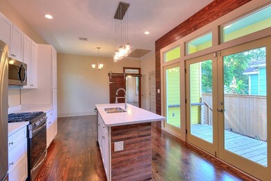 Accent wall and french doors for plenty of light!