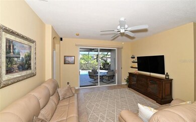 Living Room with views of the pool and lanai.  