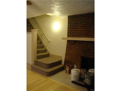 Entry/Foyer. STANDING NEAR DOORWAY. FIREPLACE AND 