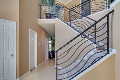 Upon entering the expansive foyer, the custom stai