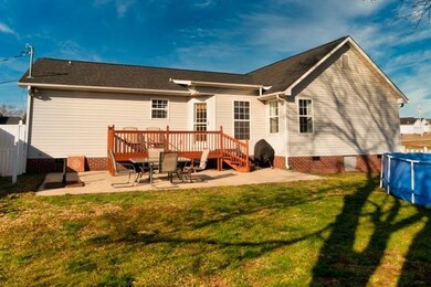 Nice back yard....deck with patio, above ground pool with updated 2 year old sand filter pump.
