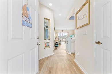 Corridor featuring LVP flooring