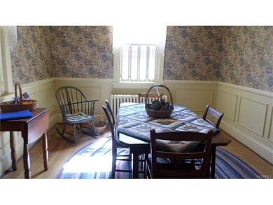 Formal Dining Room With Picture Frame Molding and 