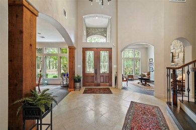 Another view of the entryway looking back towards the double 8' entry doors. Formal living room to the back right could also be used as a study, or great place for a grand piano.