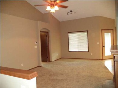 Vaulted livingroom with bull nose corners and tons