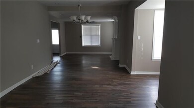 Formal Dining room leading into Living room area