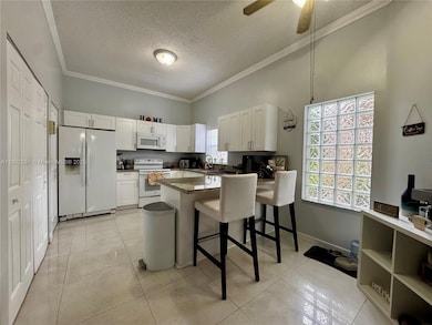 16137 Emerald Cove Rd, Weston, FL 33331 - photo 2