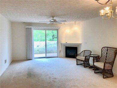 Living Room with Gas fireplace, sliding door with 