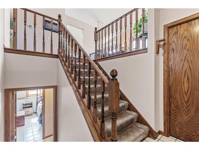 Front entryway with access to the garage to the ri