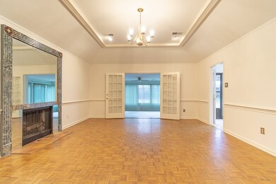 Big Great room with Fireplace and Tray Ceiling