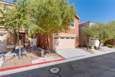 View of front facade featuring stucco siding, concrete driveway, a tiled roof, and an attached garage