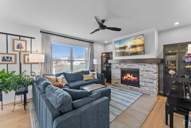 Step inside to find 9-foot ceilings and engineered hardwood flooring throughout, creating a bright, open feel. The main level features an open-concept layout ideal for both everyday living and entertaining.