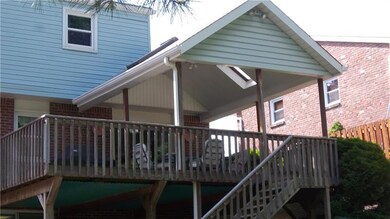 Covered patio off family room.