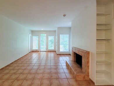 Large living room, wood burning fireplace..