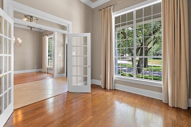   OFFICE WITH VIEW TO FRONT YARD.