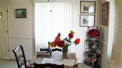 Dining room viewed from kitchen door.