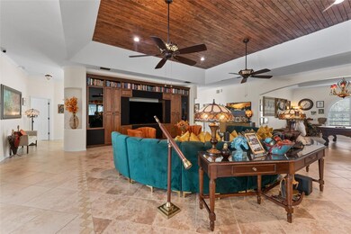 Attention to detail, custom wood ceiling accents the living space