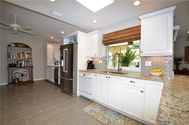 Granite countertops, tile backsplash and breakfast