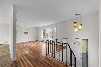 View to Living Room and Front Entry