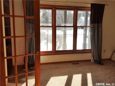 Living Room. Office/Living Room with large windows