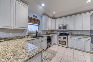 Granite counters, updated appliances & amble cabinetry for that chef at heart.