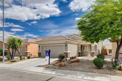 Ranch-style home featuring stucco siding, an attac