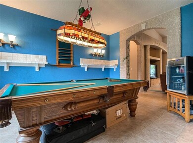 Notice the custom shelving and archways