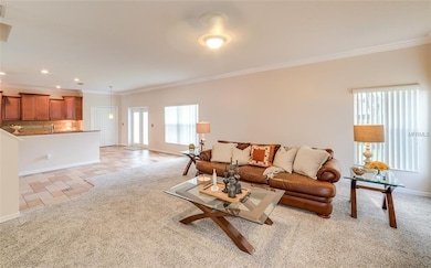 The family room is large enough for everyone in th