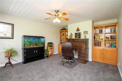 Large office with built in book shelves