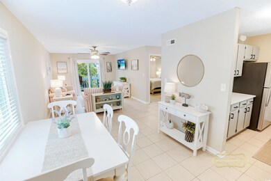 Dining space with light tile patterned flooring an