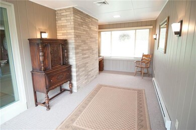 The bright family room provides great space for en
