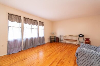 Formal Living Room with lots of windows to allow t