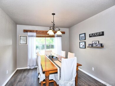 Large Dining, Chandelier. Window Treatments includ