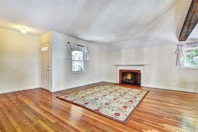 Beautiful Hardwood Floors and Romantic Fireplace t