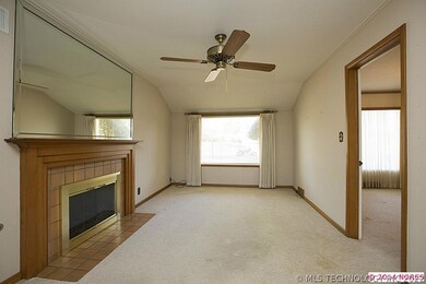 Den with fireplace