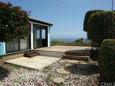 Large Trex deck off the enclosed patio.  Concrete 