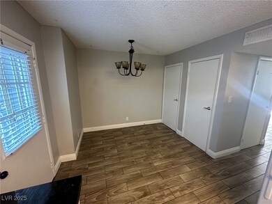 Unfurnished dining area with wood finish floors, a