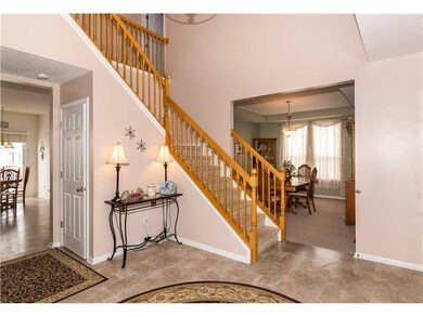 Exterior Front. 2 story entry with nice oak banister.