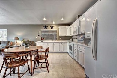 A Closer view of the Kitchen with Plenty of Cabine