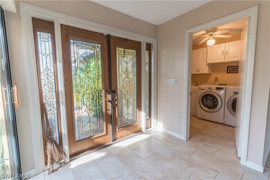 Foyer; entry to laundry room (leads to garage)