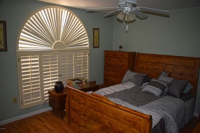 GUEST BEDROOM W/PLANTATION SHUTTERS