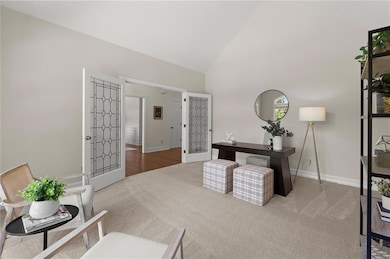 Bright and inviting office space with added privacy thanks to beautiful glass French doors.