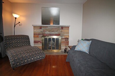 Stone front wood burning fireplace