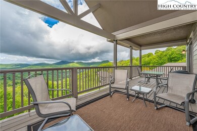 Sliding glass doors lead out onto the huge covered