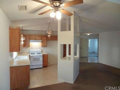 VIEW OF KITCHEN/LIVING ROOM & ENTRYWAY