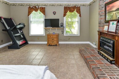 Large master bedrm includes a fireplace number 2